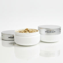 Load image into Gallery viewer, Jar of African Rose hair product with open lid showing texture on a white surface