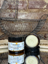 Load image into Gallery viewer, Three jars of Mummy's Belly & Booby Cream on a textured surface