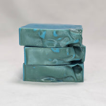 Load image into Gallery viewer, Three bars of blue soap stacked on a white background