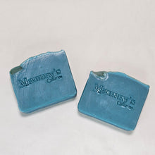 Load image into Gallery viewer, Two blue soap bars with 'Mommy's Care' branding on a light gray background