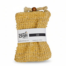 Load image into Gallery viewer, Yellow soap bag with a white label on a light gray background
