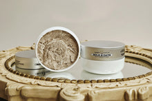 Load image into Gallery viewer, Two containers of 'Milk & Oats' scrub on a decorative surface with a neutral background.