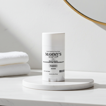 Load image into Gallery viewer, Mammy's Soap Co. deodorant on a white surface with towels in the background