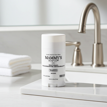 Load image into Gallery viewer, Mammy's Soap Co. deodorant stick on a bathroom counter with a faucet in the background