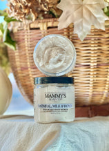 Load image into Gallery viewer, Oatmeal, Milk & Honey foaming body scrub displayed with warm fall décor.