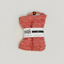 Load image into Gallery viewer, Red soap saver with 'earth craft soap co. label on a white background
