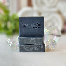 Load image into Gallery viewer, Stack of three navy soap bars stamped Mammy's Soap Co