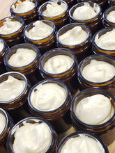Load image into Gallery viewer, many open amber glass jars showing diaper baby bottom balm
