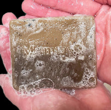 Load image into Gallery viewer, wet bar of coffee soap with lather and bubbles in hands
