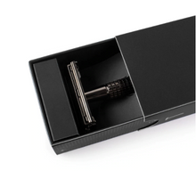 Load image into Gallery viewer, gun metal safety razor in black gift box slid partly open showing top half of razor