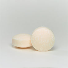 Load image into Gallery viewer, two round white shampoo pucks