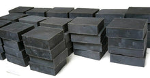Load image into Gallery viewer, 14 stacks of 4 jet black soap bars on white background
