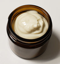 Load image into Gallery viewer, open amber glass jar showing contents of belly and booby nipple cream for pregnant and nursing women
