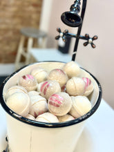 Load image into Gallery viewer, white bath bombs with pink and purple swirls 
