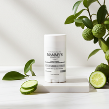 Load image into Gallery viewer, Mammy's Soap Co. deodorant stick with cucumber slices and a plant on a white surface
