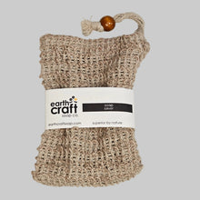 Load image into Gallery viewer, Textured beige soap bag with a label on a white background
