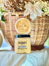 Load image into Gallery viewer, Haughty foaming body scrub displayed with warm fall décor.

