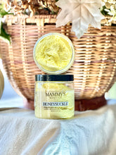 Load image into Gallery viewer, Honeysuckle foaming body scrub displayed with warm fall décor.

