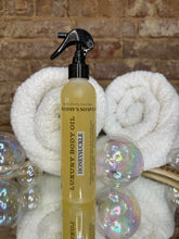 Load image into Gallery viewer, Luxury body oil bottle with spray nozzle on a towel with bubbles
