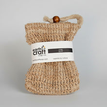 Load image into Gallery viewer, Light Brown sisal soap saver with Earth Craft Soap Co. label on a white background
