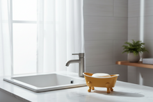 Load image into Gallery viewer, Yellow bathtub with white rim in a white bathroom
