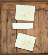 Load image into Gallery viewer, Three bars of Naked Soap on a wooden surface
