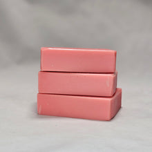 Load image into Gallery viewer, Three pink soap bars stacked on a gray background
