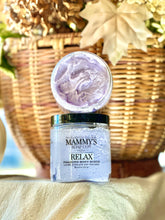 Load image into Gallery viewer, Relax foaming body scrub displayed with warm fall décor.

