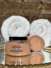 Load image into Gallery viewer, Two containers of Rose Gold body polish with white towels in the background.
