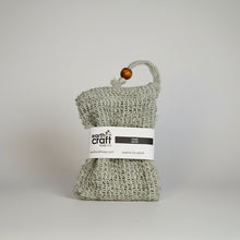 Load image into Gallery viewer, Sage green woven soap bag with a label on a white background
