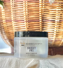 Load image into Gallery viewer, Sweet Fig body cream jar displayed with warm fall décor.

