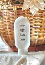 Load image into Gallery viewer, Sweet Fig hand lotion displayed with warm fall décor.


