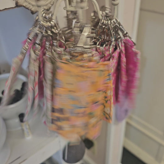 Spinning of many lip balm holders on a rotating display.