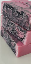 Load image into Gallery viewer, stacked tops of three bars of black velvet magenta handcrafted bar soap with black swirls
