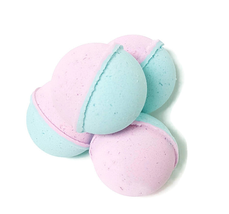 blue and pink cotton candy bath bomb scented with billowy web of sugary raspberry, strawberry, and sweet vanilla