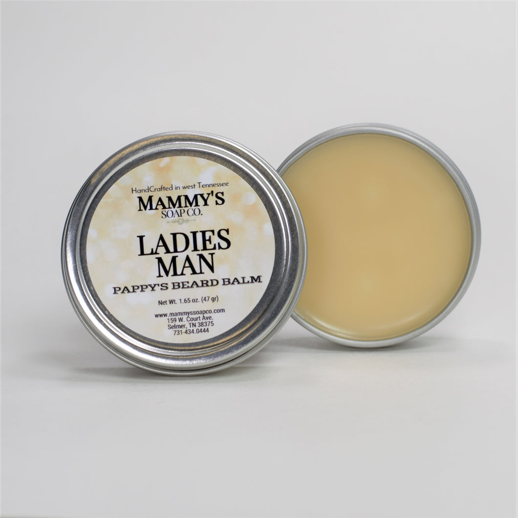 ladies man handcrafted natural beard balm in silver metal tin with screw on lid showing tin contents