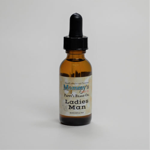 ladies man handcrafted natural beard oil in labeled amber glass bottle with dropper