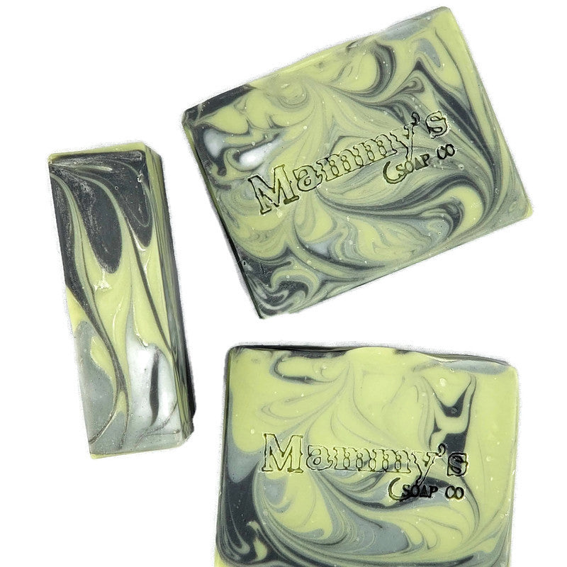 3 handmade soap bars with black, green and gray swirls, stamped Mammy's Soap Co