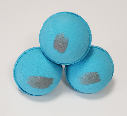 blue bath bomb with silver painted stripe scented with tropical fruits and sugared citrus - capri blue volcano