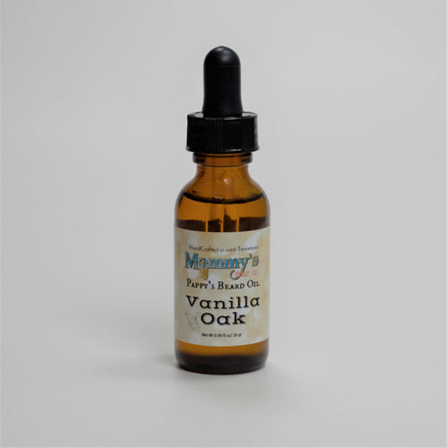 vanilla oak handcrafted natural beard oil in labeled amber glass bottle with dropper