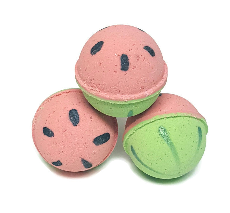 3 stacked bath bombs painted to look like watermelons