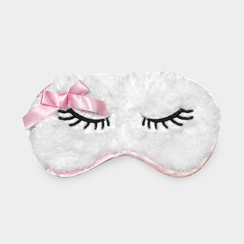 soft white and pink sleep mask with embroidered eyelashes